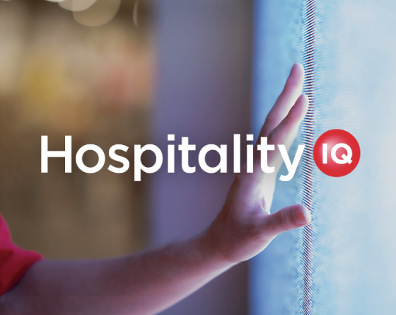 A sky blue background with light emanating from a central point, with the Hospitality IQ logo overlaid.