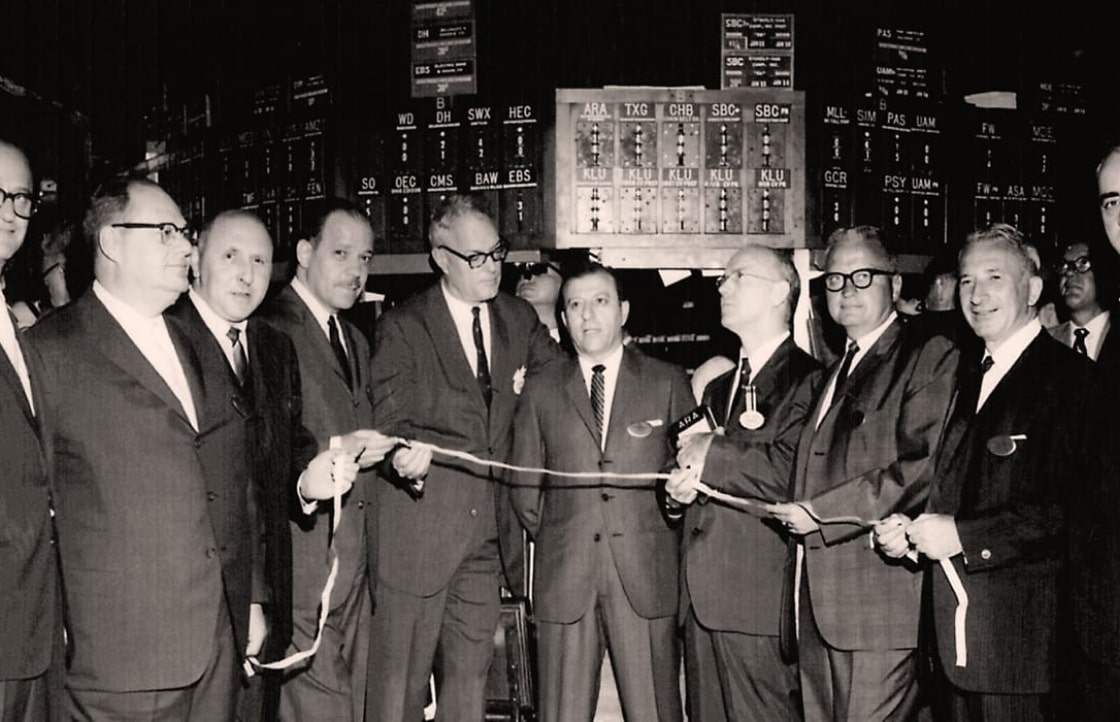 Old photo of men at stock market