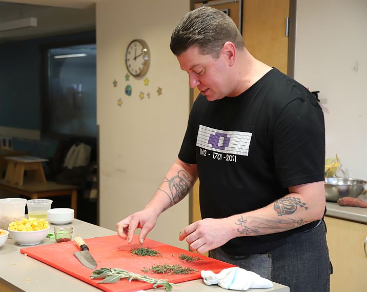 Chef Chris Commandant preparing food