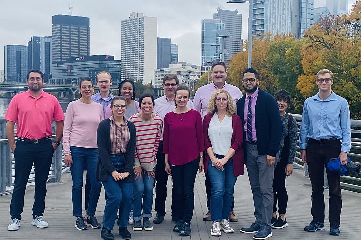employees wear pink on a wellness walk in Philadelphia
