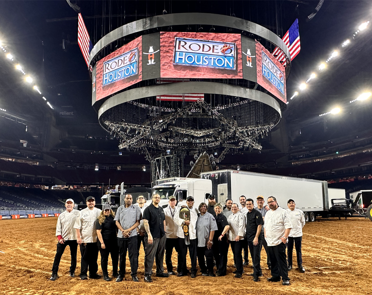 rodeo team poses together on the football field