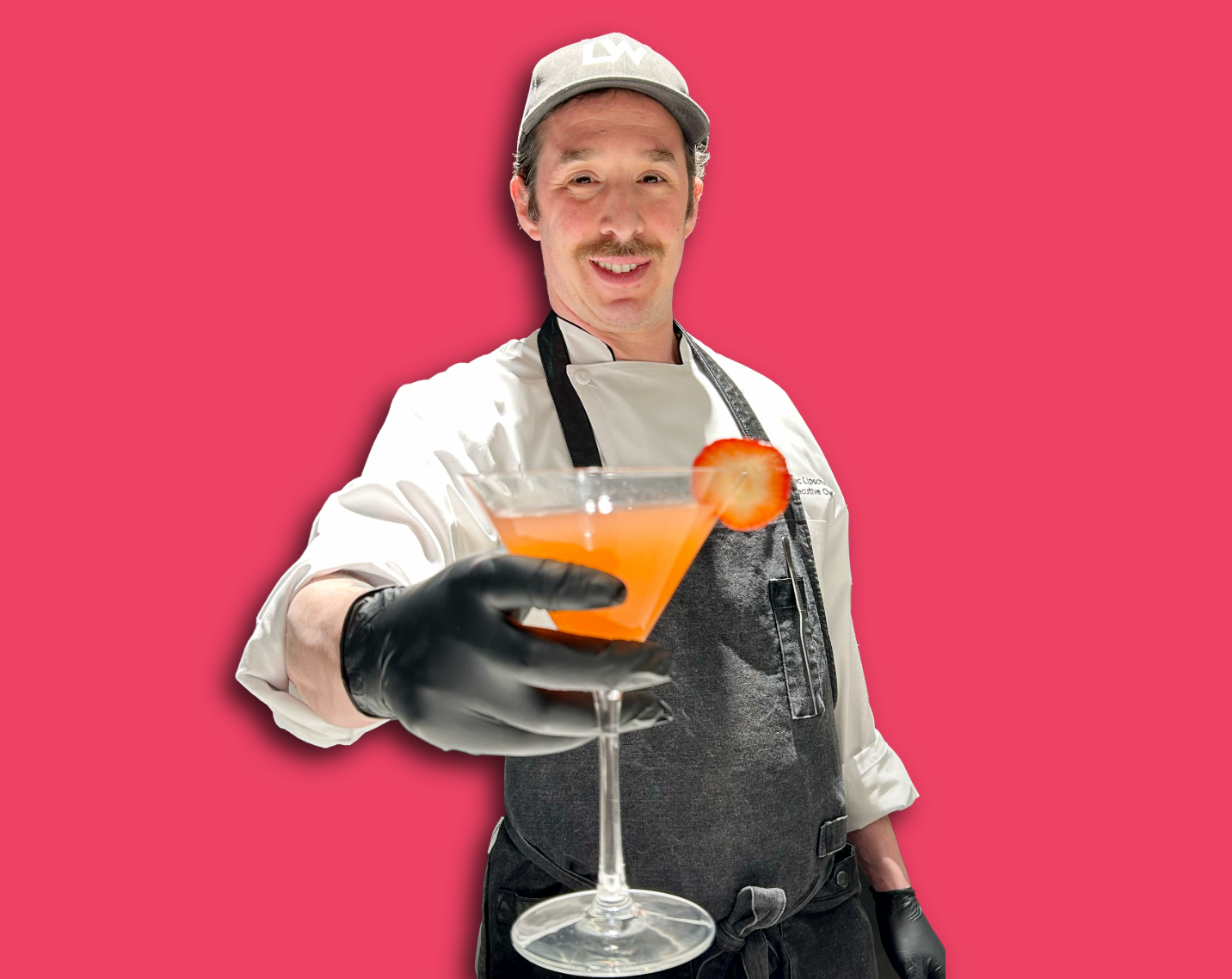 chef alec holds a hemingway daiquiri cocktail