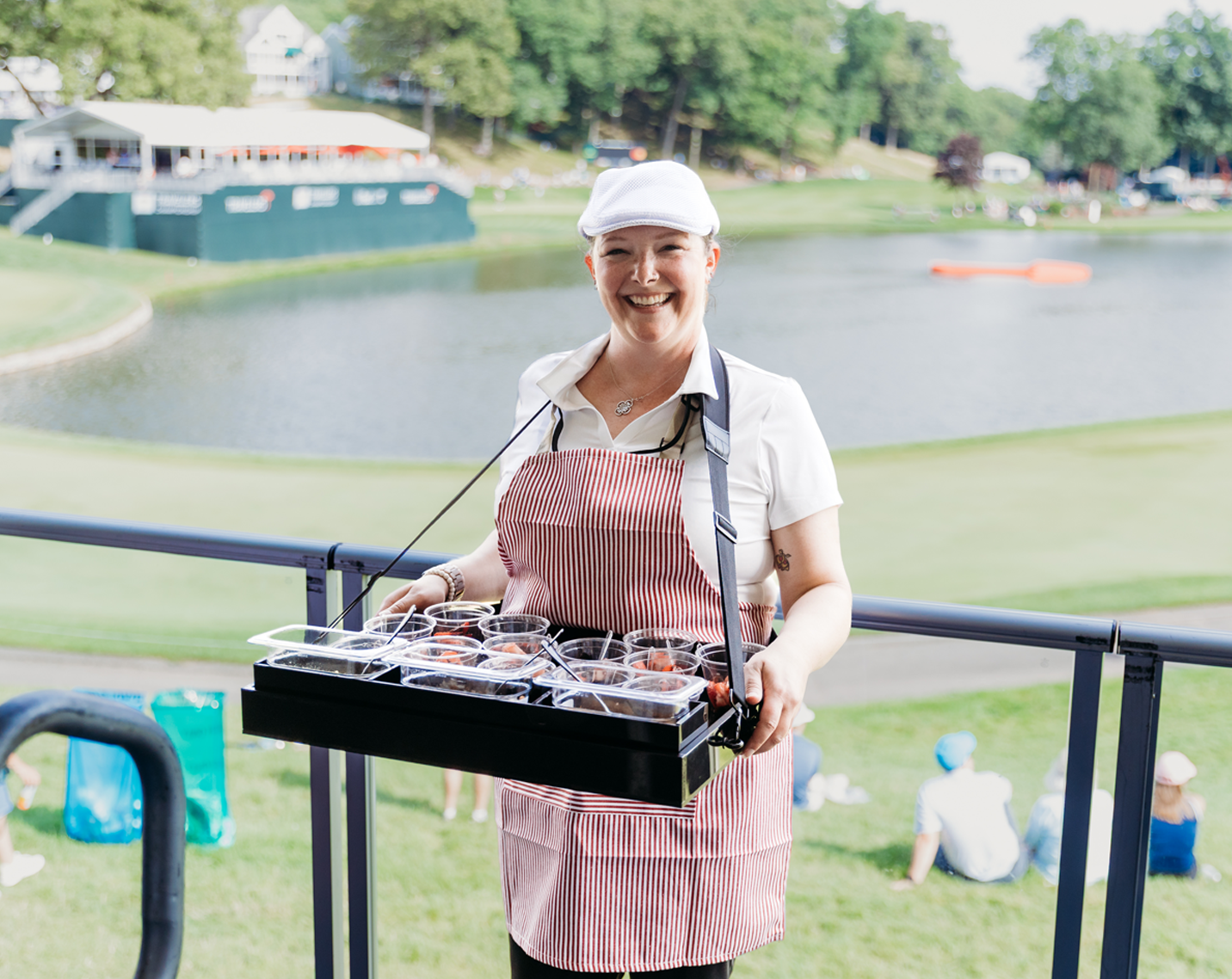 aramark employee holding food offerings