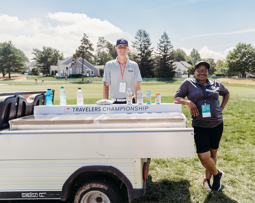 aramark employees next to a golf cart