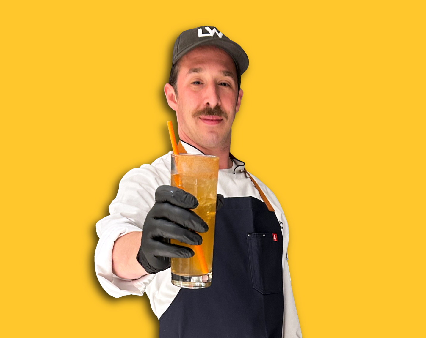 chef alec holding spritz
