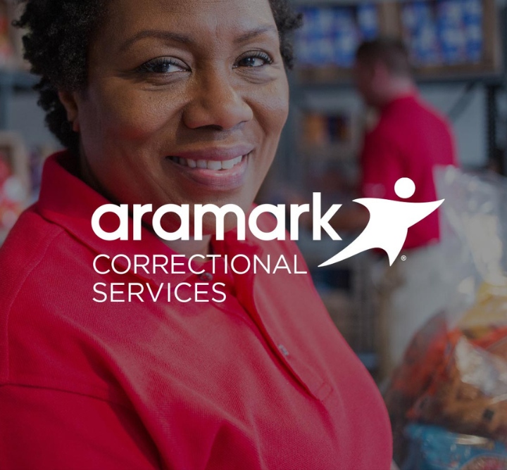 Aramark Correctional Services logo.