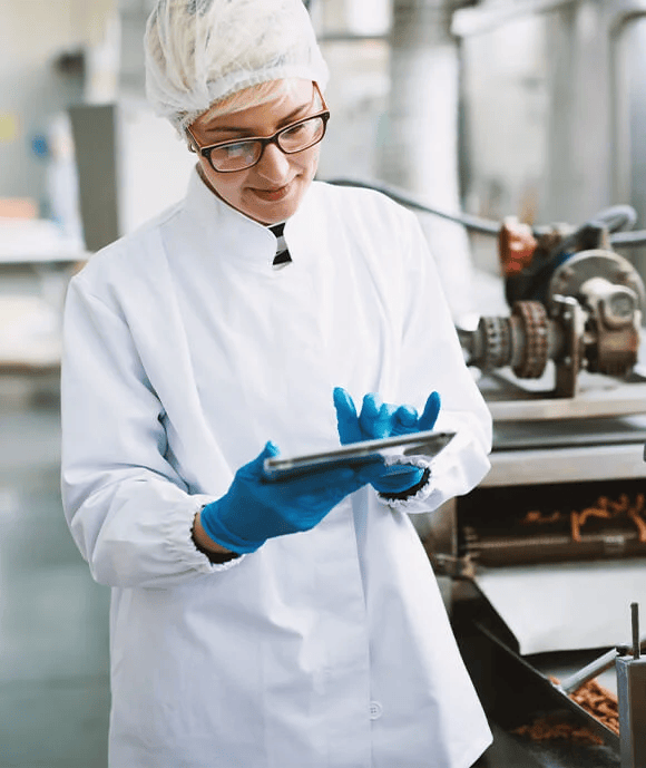 Woman in hairnet on tablet