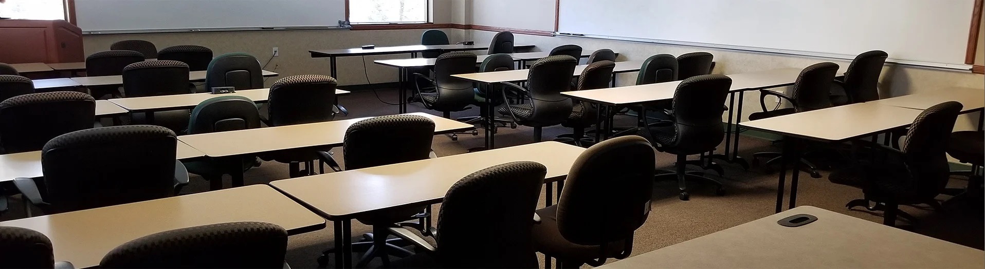 Empty seats in a classroom.