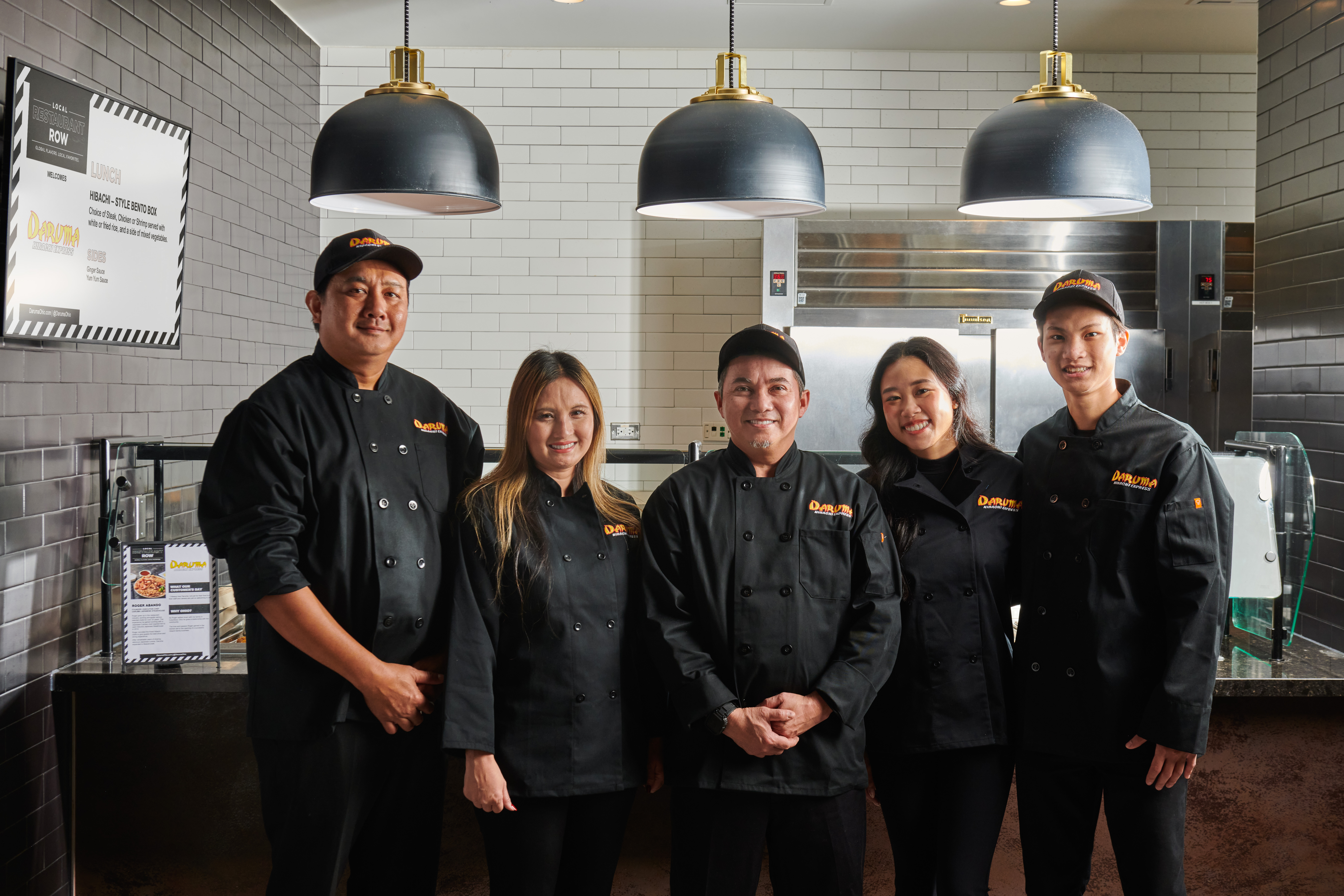 Image of five Daruma team members..