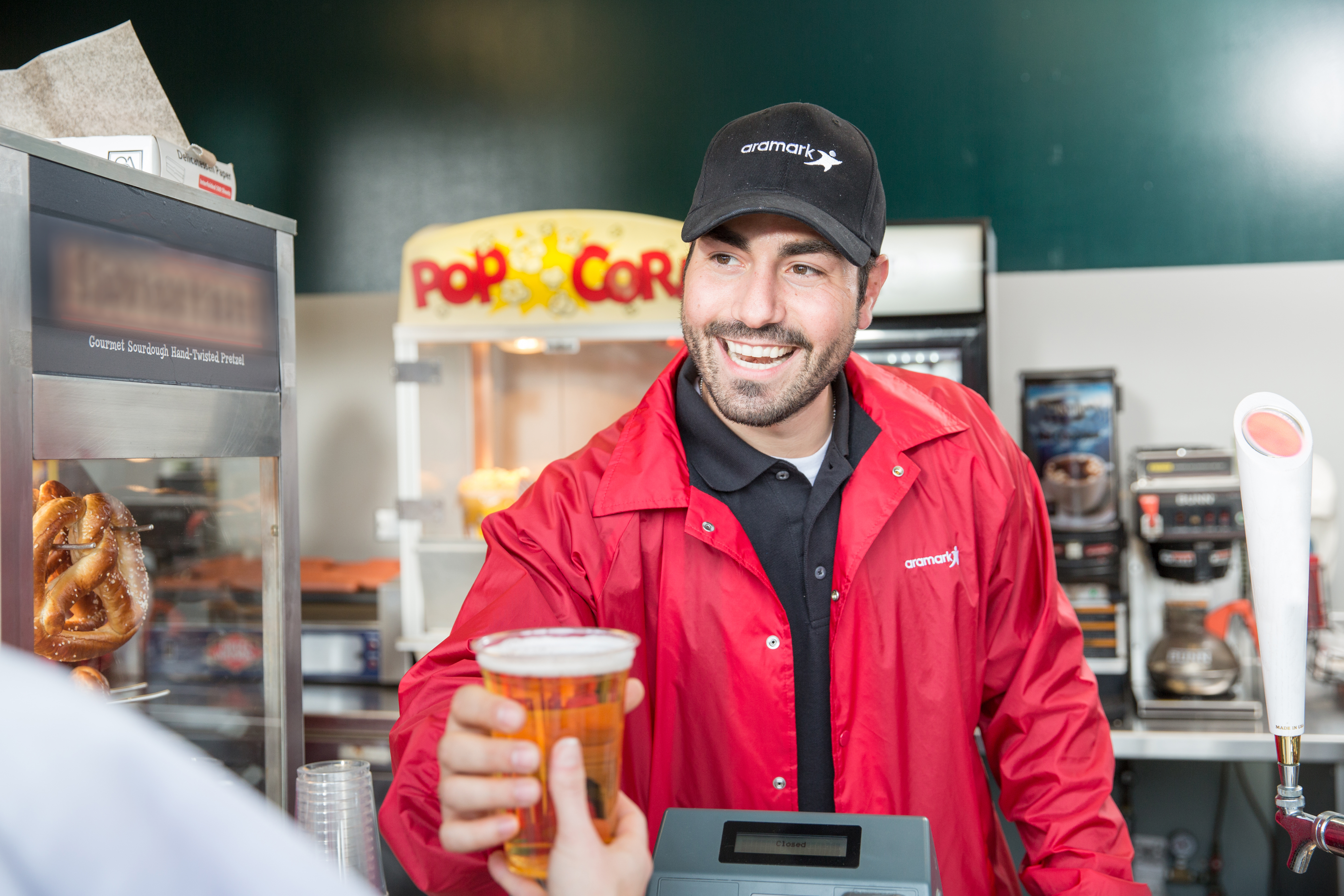 Man in red smiling