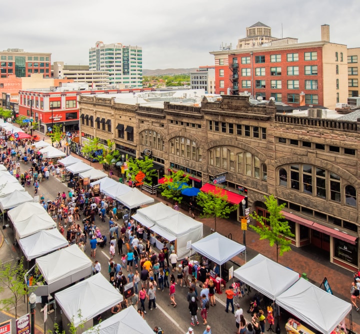 A birds-eye view of a street fair.