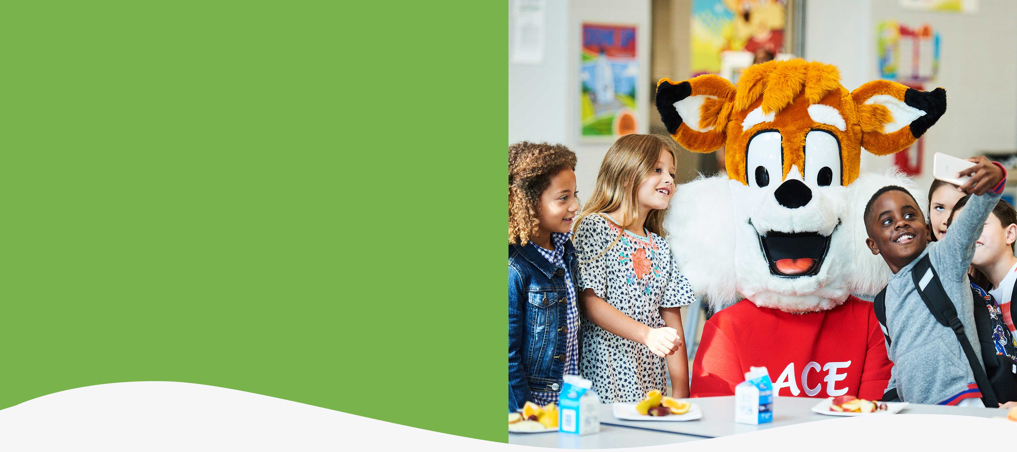Kids taking a selfie with ACE the Fox from the Student Nutrition video series, The ACE Show.