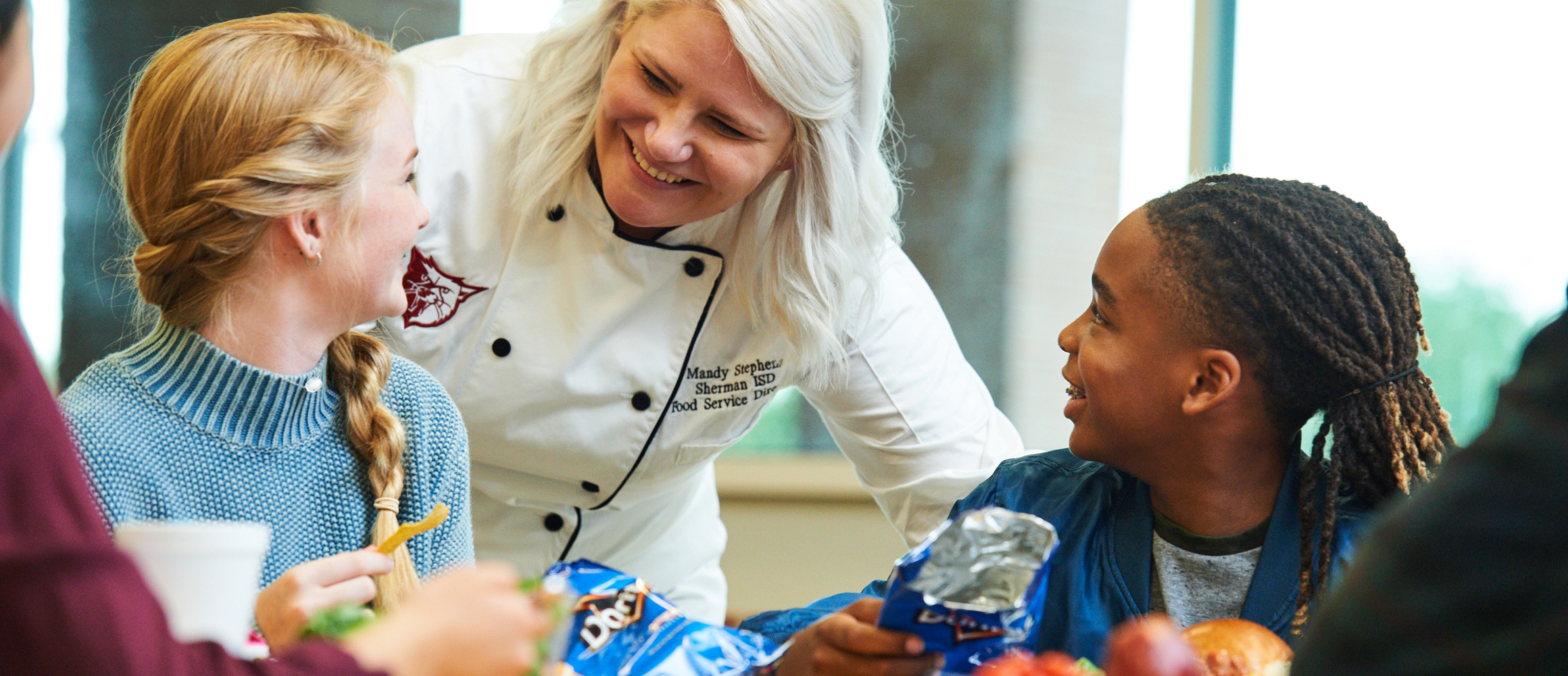 Chef smiling with children