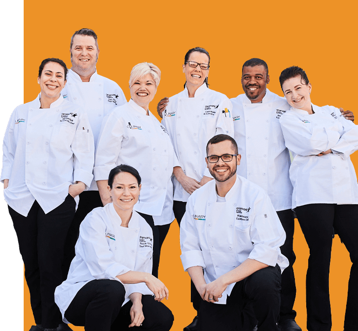 chefs pose together