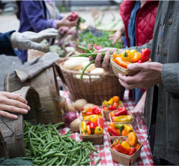 Person buying vegetables