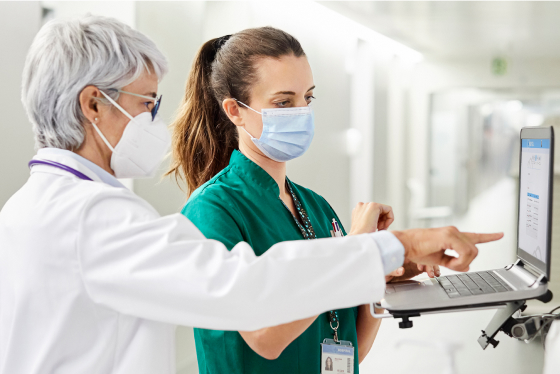 Doctor talking to healthcare staff