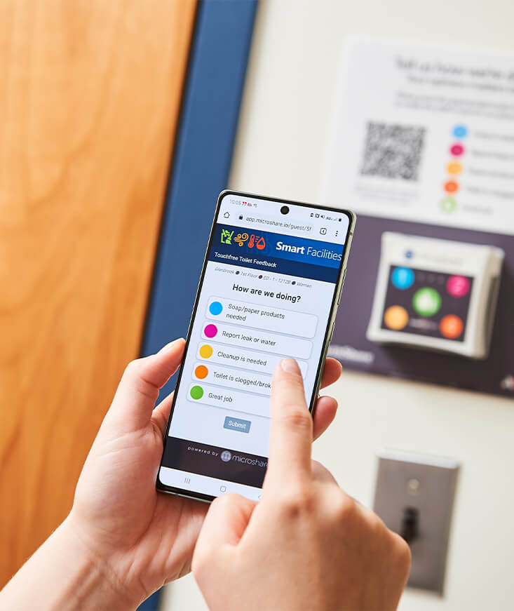 A person using the AIWX Connect app on their phone.