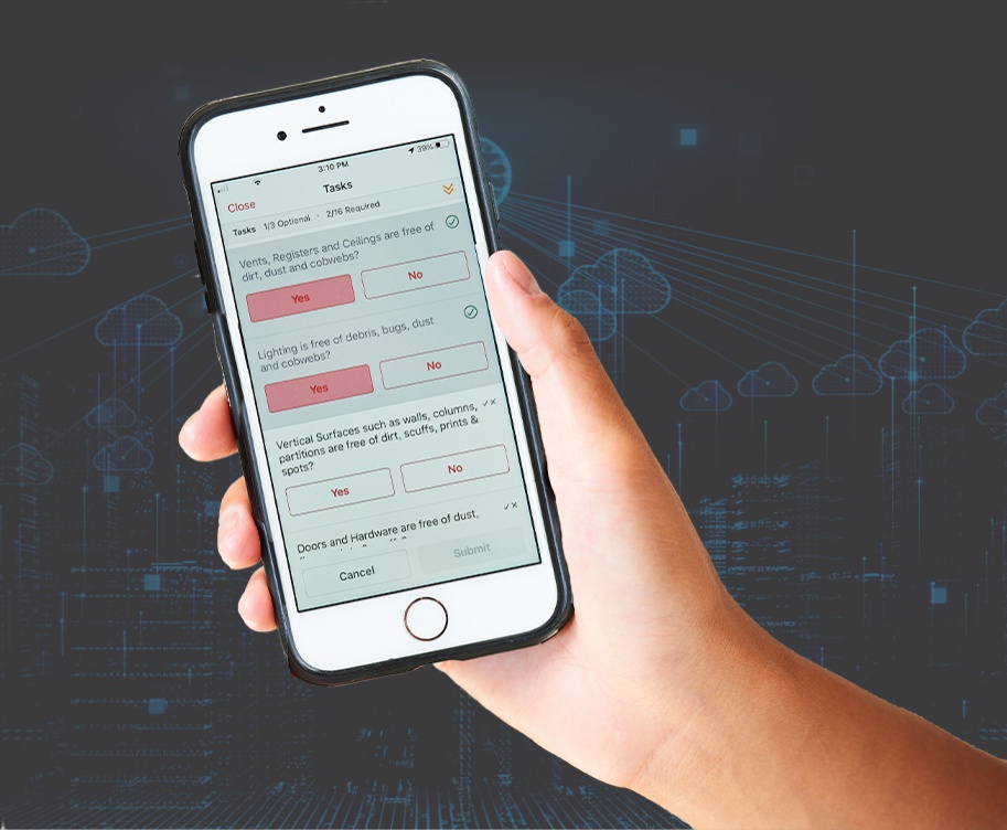 A hand holding a mobile phone showing a task checklist, with a digital cloud background behind it.