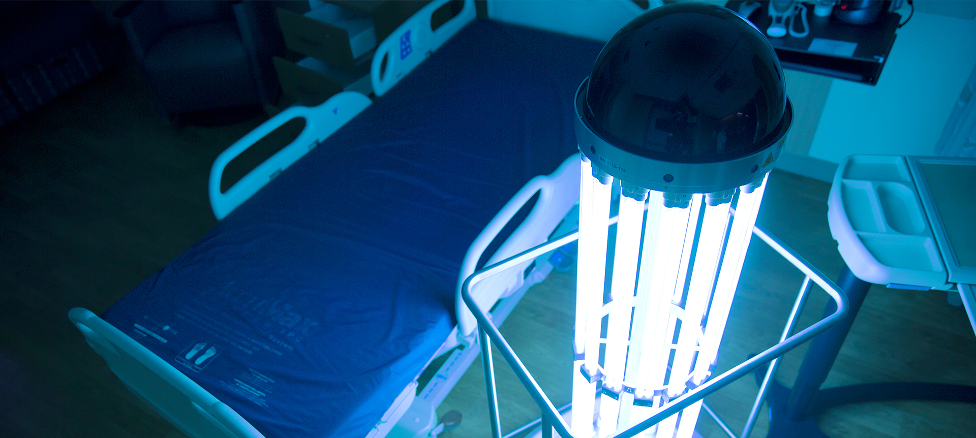 UV-C lamp actively disinfecting a hospital room.