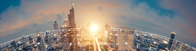 A skyline of a city with a digital graph overlaid.