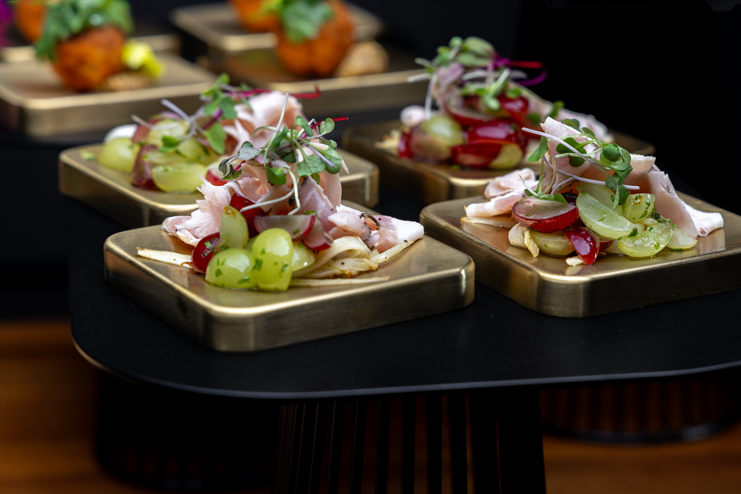 Grapes on gold plate