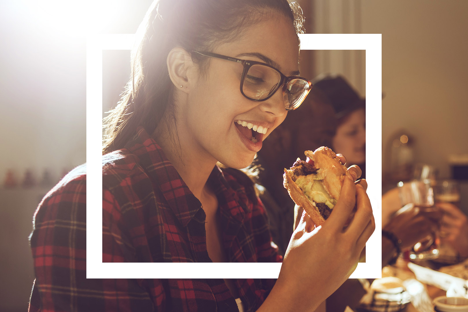 Woman easting a burger