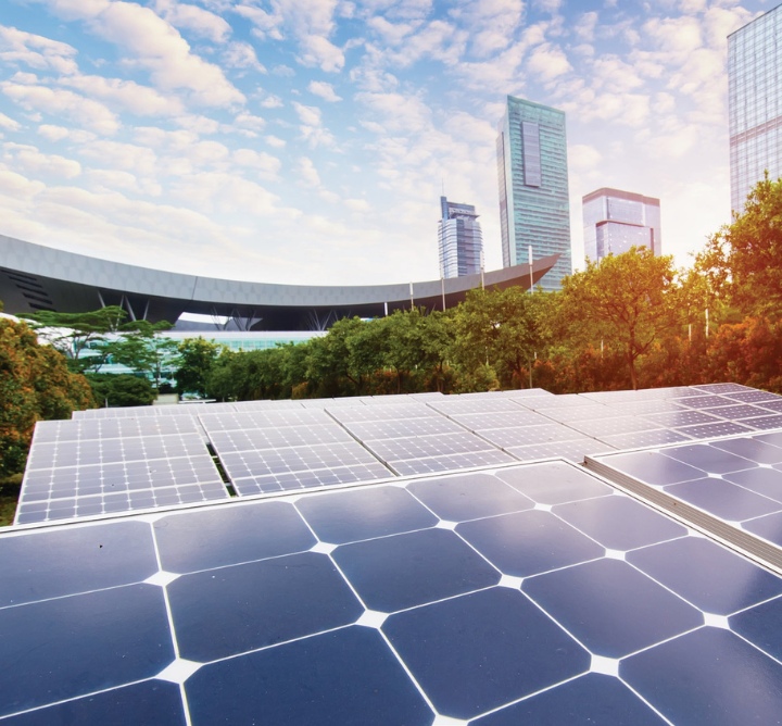 Solar panels on the outside of a convention center building.