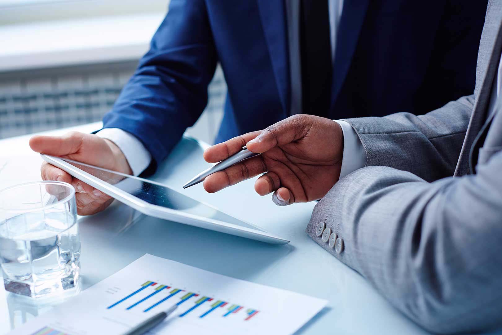 Business people looking at documents 