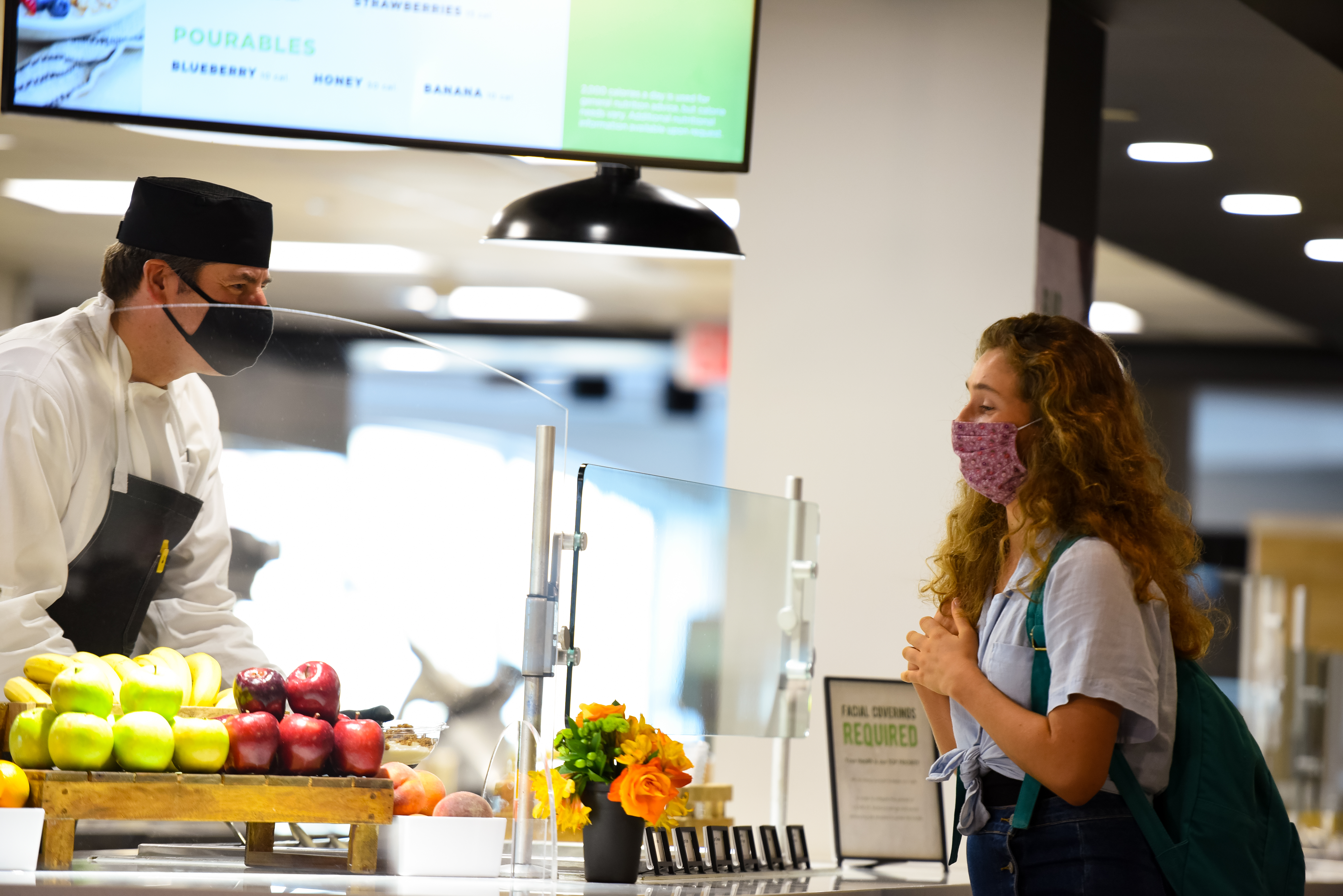 Chef helping customer